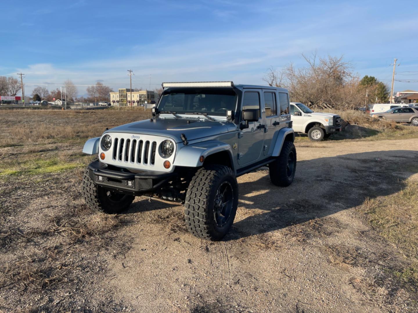 2012 Blue /Black Jeep Wrangler Artic (1C4HJWEG2CL) with an 3.6 V6 engine, AT transmission, located at 813 E Fairview Ave, Meridian , ID, 83642, (208) 336-8230, 43.618851, -116.384010 - Photo#2